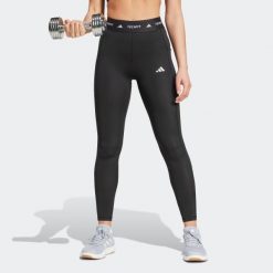 Legginsy fitness damskie ADIDAS. Legginsy adidas, bez wzorów, z materiału, sportowe. Za 149.99 zł.