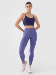 4F Legginsy treningowe bezszwowe damskie - granatowe XS/S. Niebieskie legginsy 4f, bez wzorów, z dzianiny, klasyczne. W wyprzedaży za 99.99 zł.