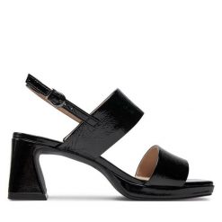 Sandały Caprice. Czarne sandały Caprice, bez wzorów, bez obcasa, na słupku, bez zapięcia. Za 299.99 zł.