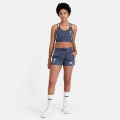 Biustonosz dla kobiet Le Coq Sportif Training N° 1. Niebieskie biustonosze sportowe Le Coq Sportif, bez wzorów. Za 276.00 zł.