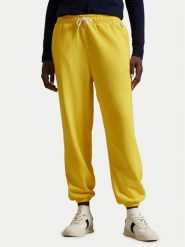 Polo Ralph Lauren Spodnie dresowe 211935585014 Żółty Regular Fit. Żółte spodnie dresowe Polo Ralph Lauren, bez wzorów, z bawełny. Za 389.99 zł.