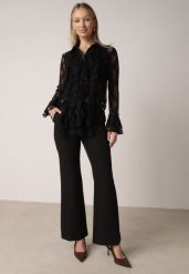 Czarne Garniturowe Spodnie VICES o Kroju Dzwonów Tessaria. Czarne jeansy Born2be, l, bez wzorów, z jeansu, eleganckie. Za 109.99 zł.