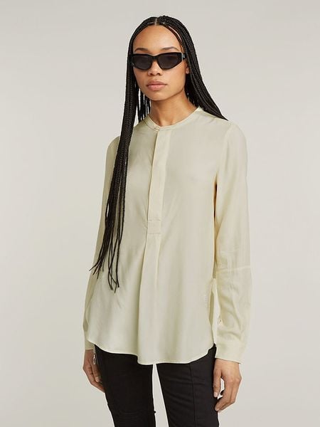 G-Star Bluzka w kolorze kremowym rozmiar: M. Brązowe bluzki G-Star, m, bez wzorów, retro, bez kołnierzyka, bez ramiączek. Za 183.15 zł.