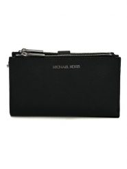 Michael Kors Skórzany portfel w kolorze czarnym - 18 x 10,5 x 4 cm rozmiar: onesize. Czarne portfele Michael Kors, bez wzorów, z materiału. Za 665.09 zł.