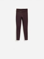 Gładkie legginsy - ciemnofioletowy. Fioletowe legginsy Reserved, bez wzorów, z dzianiny. Za 89.99 zł.