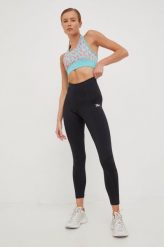 Reebok legginsy treningowe Meet You There damskie kolor czarny gładkie. Czarne legginsy Reebok, bez wzorów, z materiału. W wyprzedaży za 144.99 zł.
