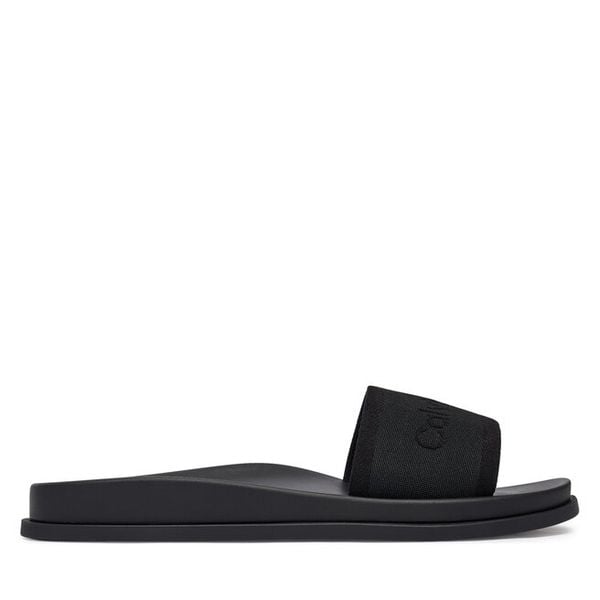 Klapki Calvin Klein. Czarne klapki Calvin Klein, bez wzorów, bez obcasa, bez zapięcia. Za 369.99 zł.
