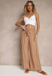 Jasnobrązowe Spodnie z Wiskozy o Szerokim Kroju z Kokardą Ellioria. Brązowe jeansy Renee, l, bez wzorów, z jeansu, eleganckie. W wyprzedaży za 29.99 zł.