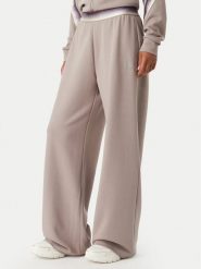 EA7 Emporio Armani Spodnie dresowe 7W001517 AF12501 U6100 Beżowy ciemny Wide Leg. Brązowe spodnie dresowe EA7 Emporio Armani, bez wzorów, z dresówki. Za 514.99 zł.