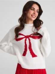 Sweter z motywem kokardy - kremowy. Białe swetry Sinsay, l, bez wzorów, wizytowe, bez ramiączek. Za 69.99 zł.