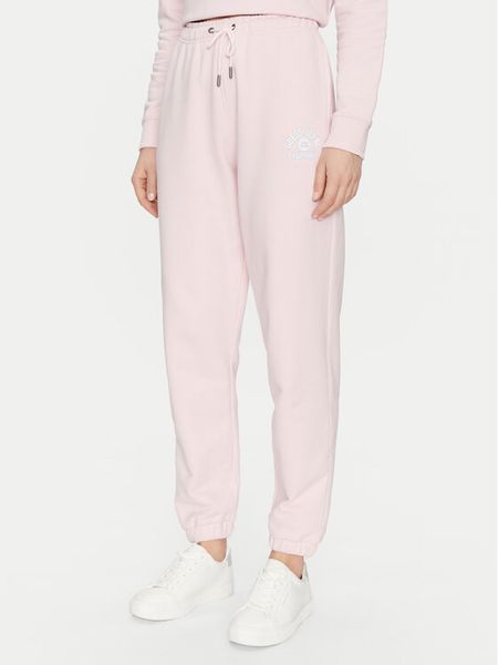 Guess Jeans Spodnie dresowe W5RB63 K68I4 Beżowy Regular Fit. Brązowe spodnie dresowe Guess Jeans, z aplikacjami, z bawełny. Za 169.99 zł.