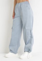 Niebieskie Spodnie Bojówki ze Ściągaczami i Kieszeniami Ilissa. Niebieskie jeansy Born2be, m, bez wzorów, z jeansu, eleganckie. Za 159.99 zł.