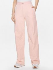 Guess Spodnie dresowe Logo V4RB13 KC2W0 Różowy Relaxed Fit. Czerwone spodnie dresowe Guess, z aplikacjami, z bawełny. Za 289.99 zł.