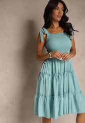 Jasnoniebieska Sukienka z Wiskozą o Rozkloszowanym Kroju na Ramiączkach z Wiązaniem Aranive. Niebieskie sukienki Renee, na co dzień, m, bez wzorów, z wiskozy, eleganckie, bez kołnierzyka, bez ramiączek, midi, proste. Za 49.99 zł.