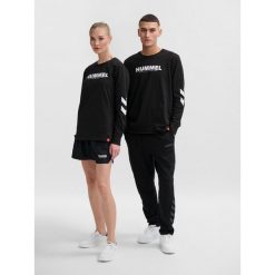 Bluza Hummel hmlLEGACY. Czarne bluzy Hummel, l, bez wzorów, młodzieżowe, bez ramiączek, bez kaptura. Za 177.50 zł.