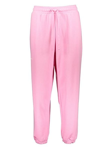 New Balance Spodnie dresowe "Essentials" w kolorze różowym rozmiar: M. Różowe spodnie dresowe New Balance, bez wzorów, z dresówki. Za 87.61 zł.