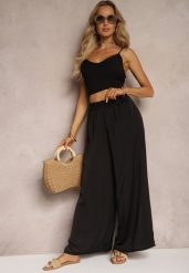 Czarne Wiskozowe Spodnie Szerokie High Waist Rissalene. Czarne jeansy Renee, l, bez wzorów, z jeansu, biznesowe, z podwyższonym stanem. W wyprzedaży za 39.99 zł.