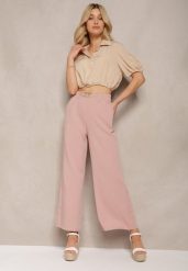 Jasnoróżowe Spodnie z Szerokimi Nogawkami w Stylu Palazzo High Waist z Gumką w Pasie z Ozdobnym Elementem Ellsiana. Czerwone jeansy Renee, bez wzorów, z bawełny, eleganckie, z podwyższonym stanem. W wyprzedaży za 35.99 zł.