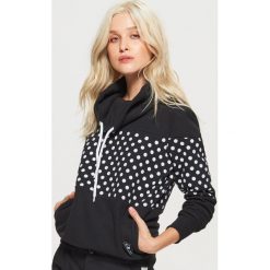 Wzorzysta bluza z kołnierzem - Czarny. Bluzy marki DOMYOS. W wyprzedaży za 49.99 zł.