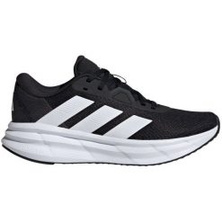 Buty adidas Galaxy 7 Running ID8765 czarne. Czarne buty do biegania bez wzorów, z gumy, bez zapięcia, do biegania. Za 319.61 zł.