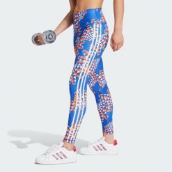 Legginsy adidas x FARM Rio 7/8. Brązowe legginsy adidas, bez wzorów, z materiału, sportowe. W wyprzedaży za 184.95 zł.