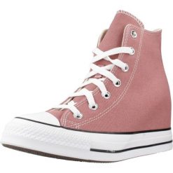 Buty CONVERSE CHUCK TAYLOR ALL STAR WEDGE Czerwony. Czerwone buty sportowe lifestyle Converse, bez wzorów, bez zapięcia. Za 368.99 zł.