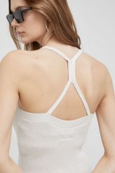 Calvin Klein top damski kolor beżowy. Brązowe topy Calvin Klein, l, bez wzorów, z dzianiny, bez kołnierzyka, bez ramiączek. Za 579.99 zł.
