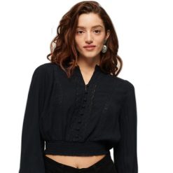 Damska bluzka z długim rękawem i koronkowym wykończeniem Superdry. Niebieskie bielizna termoaktywna damska Superdry, bez wzorów, z koronki, bez ramiączek. Za 284.00 zł.