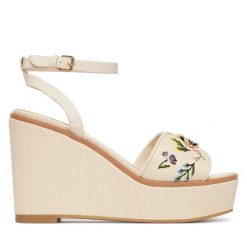 Sandały Aldo. Brązowe sandały Aldo, bez wzorów, bez obcasa, na koturnie, bez zapięcia. Za 419.99 zł.