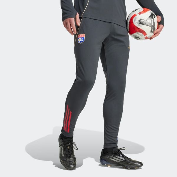 Spodnie piłkarskie treningowe ADIDAS Olympique Lyonnais 25/26. Spodnie dresowe DOUBLE D, bez wzorów. Za 199.99 zł.