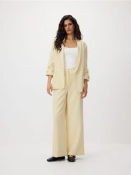 Marynarka z dodatkiem wiskozy - jasnożółty. Żółte marynarki i żakiety Reserved, l, bez wzorów, z tkaniny, bez ramiączek. Za 199.99 zł.