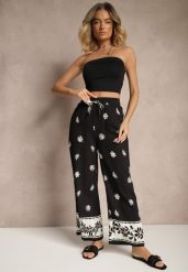 Czarne Wiskozowe Spodnie o Szerokim Kroju z Gumką w Pasie w Kwiatowy Wzór Nimilassa. Czarne jeansy Renee, bez wzorów, z jeansu, eleganckie. W wyprzedaży za 68.99 zł.