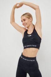 The North Face biustonosz sportowy kolor czarny wzorzysty. Czarne biustonosze sportowe The North Face, bez wzorów, z dzianiny, na jogę i pilates. Za 249.99 zł.