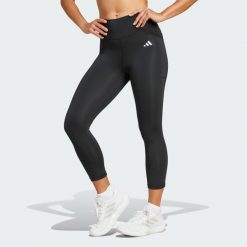 Legginsy Optime Essentials Stash 3/4. Czarne legginsy adidas, bez wzorów, z materiału. Za 179.00 zł.