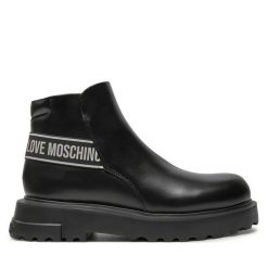 Botki LOVE MOSCHINO. Czarne botki Love Moschino, bez wzorów, bez obcasa, na płaskiej podeszwie, bez zapięcia. Za 559.99 zł.