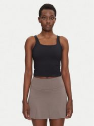 Girlfriend Collective Top Tommy 1045 Czarny Slim Fit. Czarne topy sportowe GIRLFRIEND COLLECTIVE, l, bez wzorów, z syntetyku, na fitness i siłownię. Za 199.99 zł.