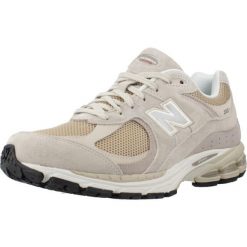 Buty New Balance 2002R Beżowe. Brązowe buty do biegania New Balance, bez wzorów, z zamszu, bez zapięcia, do biegania. Za 654.45 zł.