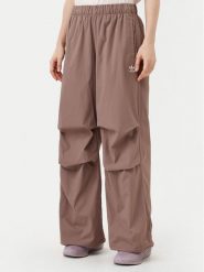 Adidas Spodnie dresowe Essentials Ripstop JD0783 Beżowy Loose Fit. Brązowe spodnie dresowe adidas, bez wzorów, z dresówki. Za 179.99 zł.