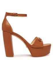 Guess Sandały FLJSET LEA03 Brązowy. Brązowe sandały Guess, z aplikacjami, ze skóry, bez obcasa, na słupku, bez zapięcia. Za 499.99 zł.