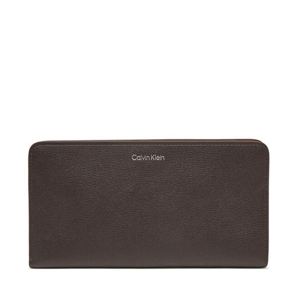 Portfel Calvin Klein. Brązowe portfele Calvin Klein, bez wzorów. Za 289.99 zł.