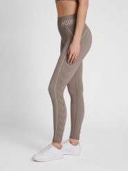 Damskie legginsy ze średnim stanem Hummel TE Christel. Szare legginsy Hummel, bez wzorów, z dzianiny. Za 184.00 zł.