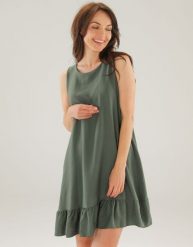 Zielona sukienka z wiązaniem. Zielone sukienki Unisono, l, bez wzorów, z tkaniny, bez kołnierzyka, bez ramiączek, mini, rozkloszowane. Za 139.00 zł.