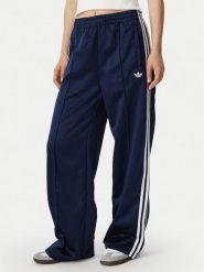 Adidas Spodnie dresowe Satin Sst Loose Trackpant KS7339 Granatowy Relaxed Fit. Niebieskie spodnie dresowe adidas, bez wzorów, z dresówki. Za 349.99 zł.