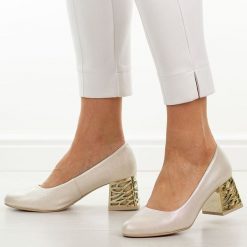 Złote mar. Polskie czółenka damskie Suzana 594. Żółte czółenka Suzana, na jesień, bez wzorów, ze skóry, eleganckie, z okrągłym noskiem, bez obcasa, na obcasie, bez zapięcia. Za 249.00 zł.