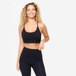 Stanik sportowy Domyos prążkowany. Czarne biustonosze sportowe DOMYOS, bez wzorów, z elastanu, na fitness i siłownię. Za 69.99 zł.