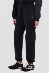 GUESS Czarne damskie spodnie dresowe Primula, Rozmiar L. Czarne spodnie dresowe Guess, z aplikacjami, z dresówki. W wyprzedaży za 217.99 zł.