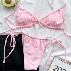 Bikini wiązane na plażę i do pływania Kamillah. Czerwone bikini Intica, bez wzorów, z materiału, eleganckie. Za 119.00 zł.