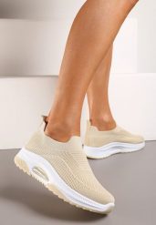 Beżowe Wsuwane Buty Sportowe na Koturnie z Perforacją Mellarina. Brązowe buty sportowe lifestyle Born2be, bez wzorów, bez zapięcia. W wyprzedaży za 46.74 zł.