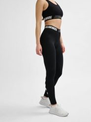 Damskie bawełniane legginsy o średnim kroju Hummel TE Maja. Czarne legginsy Hummel, bez wzorów, z bawełny, klasyczne. Za 161.50 zł.