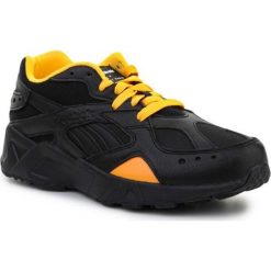 Buty Reebok x Gigi Hadid Aztrek AZDV6514 czarne. Czarne buty treningowe bez wzorów, z materiału, bez zapięcia. Za 872.66 zł.